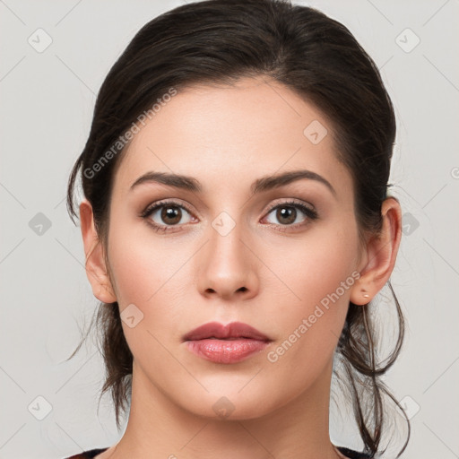 Neutral white young-adult female with medium  brown hair and brown eyes