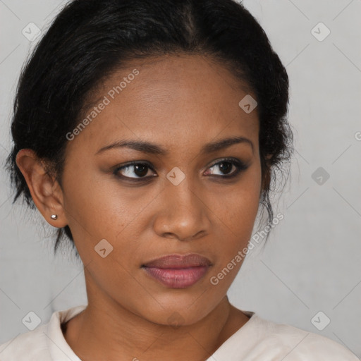 Joyful black young-adult female with medium  brown hair and brown eyes