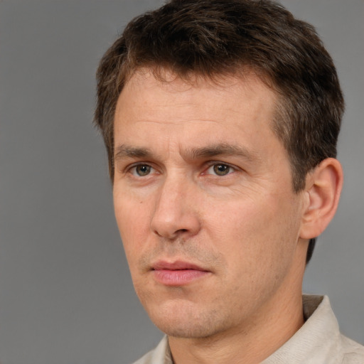 Neutral white adult male with short  brown hair and brown eyes