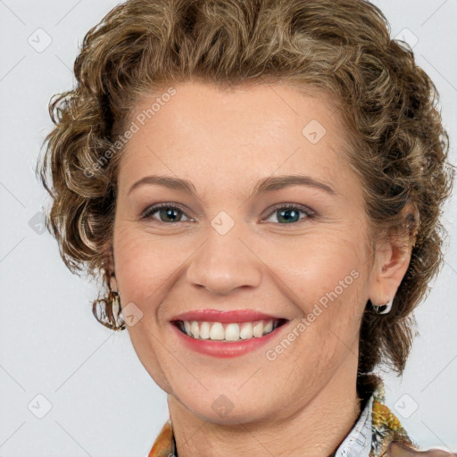 Joyful white young-adult female with medium  brown hair and green eyes