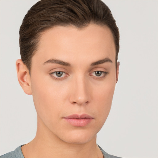 Neutral white young-adult female with short  brown hair and brown eyes