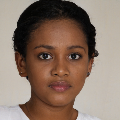 Neutral black young-adult female with short  brown hair and brown eyes