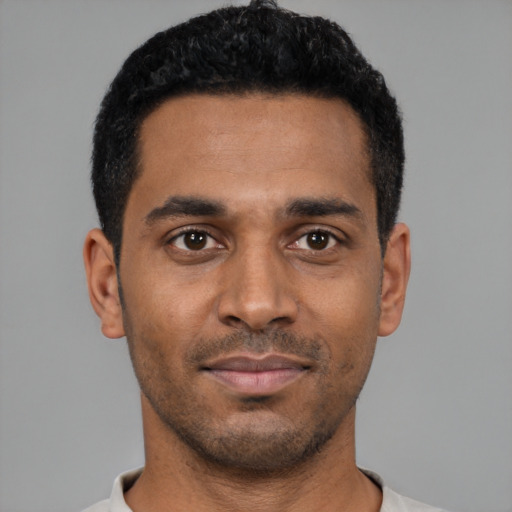 Neutral black young-adult male with short  black hair and brown eyes