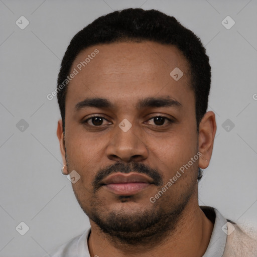 Neutral latino young-adult male with short  black hair and brown eyes