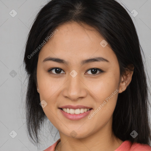 Joyful asian young-adult female with long  brown hair and brown eyes