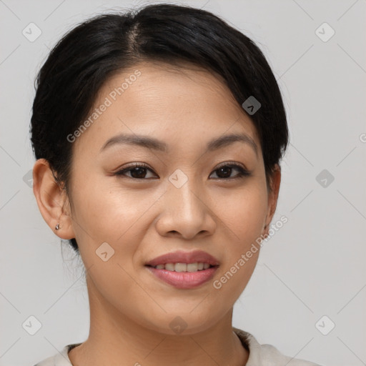 Joyful asian young-adult female with short  brown hair and brown eyes