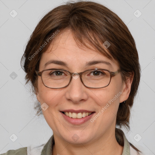 Joyful white adult female with medium  brown hair and brown eyes