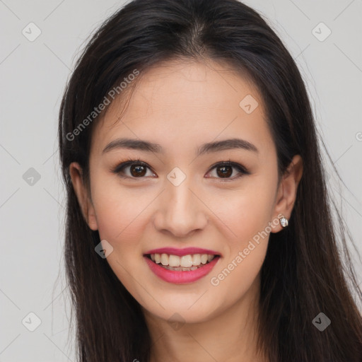 Joyful asian young-adult female with long  brown hair and brown eyes