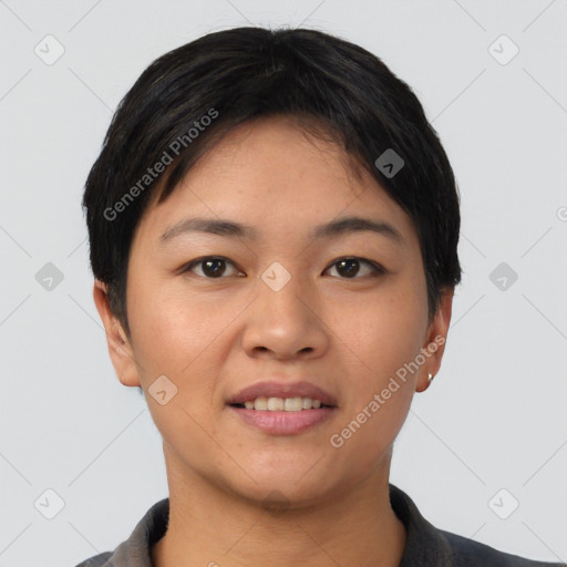 Joyful asian young-adult female with short  black hair and brown eyes