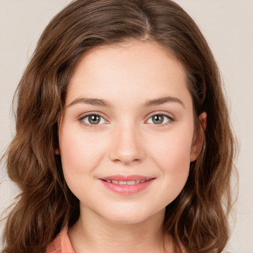 Joyful white young-adult female with medium  brown hair and green eyes