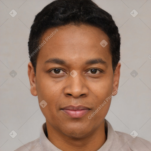 Joyful black young-adult male with short  black hair and brown eyes
