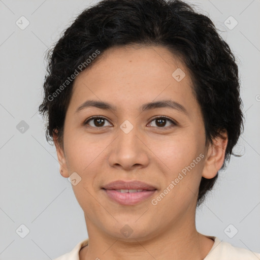 Joyful latino young-adult female with short  brown hair and brown eyes