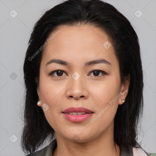 Joyful asian young-adult female with medium  brown hair and brown eyes