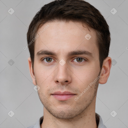 Neutral white young-adult male with short  brown hair and grey eyes