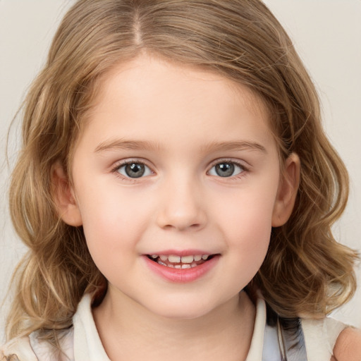 Joyful white child female with medium  brown hair and grey eyes