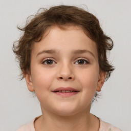 Joyful white child female with short  brown hair and brown eyes