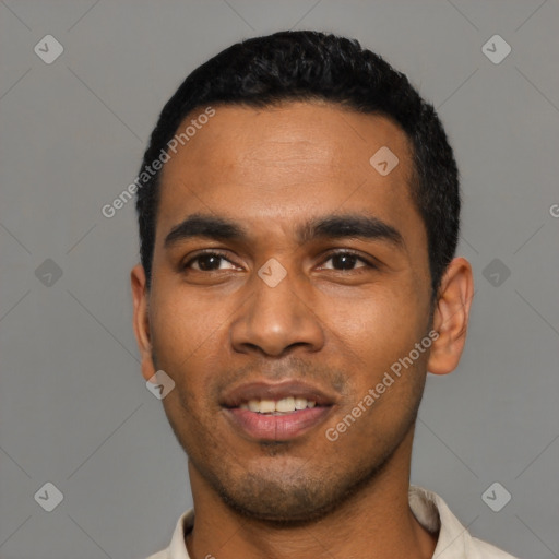 Joyful latino young-adult male with short  black hair and brown eyes