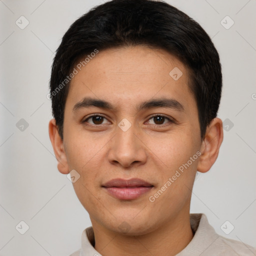 Joyful white young-adult male with short  black hair and brown eyes