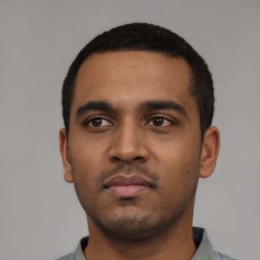Neutral black young-adult male with short  black hair and brown eyes