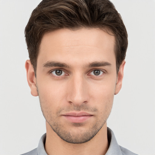 Neutral white young-adult male with short  brown hair and brown eyes