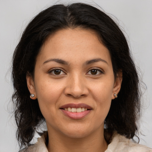 Joyful white young-adult female with medium  brown hair and brown eyes