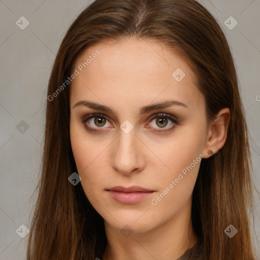 Neutral white young-adult female with long  brown hair and brown eyes