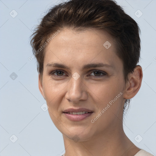 Joyful white young-adult female with short  brown hair and brown eyes