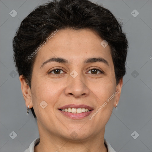 Joyful white adult female with short  brown hair and brown eyes