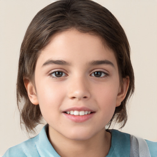 Joyful white child female with medium  brown hair and brown eyes