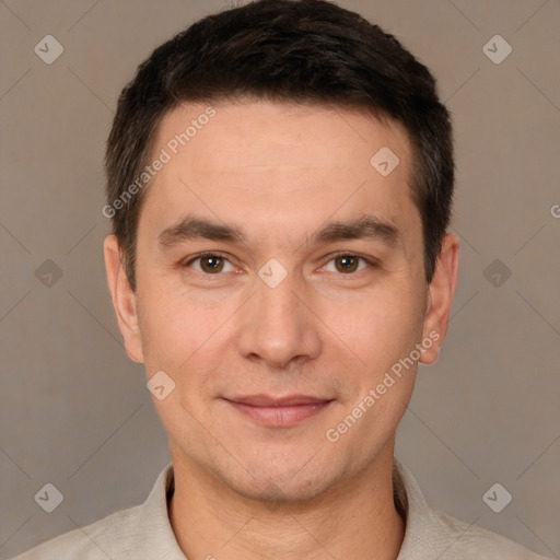 Joyful white adult male with short  brown hair and brown eyes