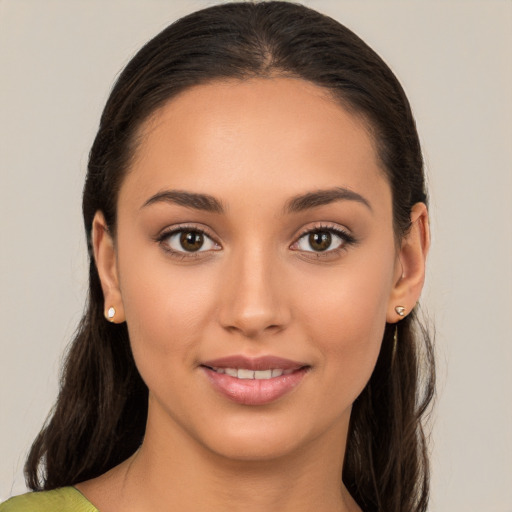 Joyful white young-adult female with medium  brown hair and brown eyes