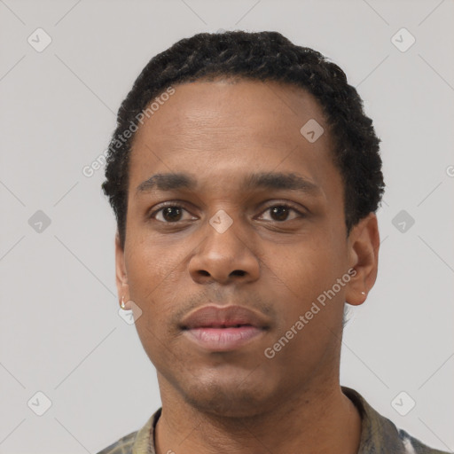 Neutral black young-adult male with short  black hair and brown eyes