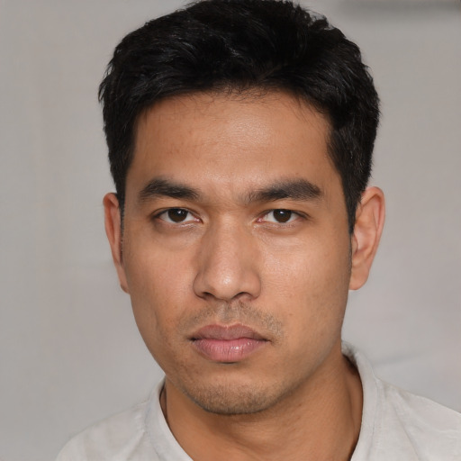 Neutral asian young-adult male with short  black hair and brown eyes