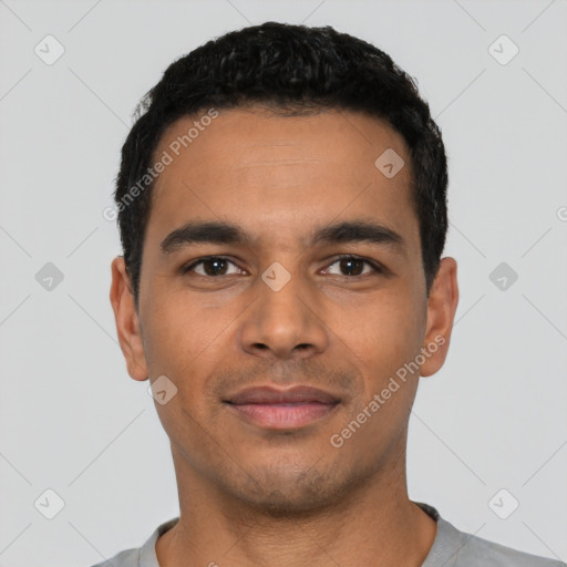 Neutral latino young-adult male with short  black hair and brown eyes