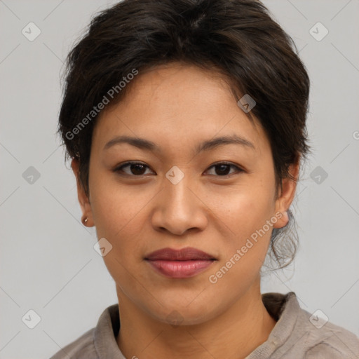 Joyful asian young-adult female with short  brown hair and brown eyes