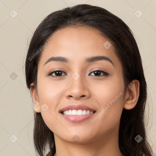 Joyful white young-adult female with long  black hair and brown eyes