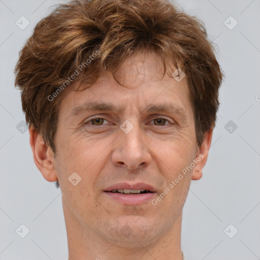 Joyful white middle-aged male with short  brown hair and brown eyes