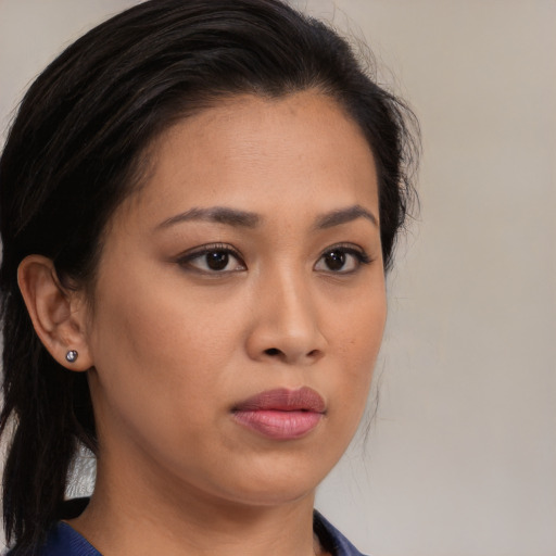 Neutral asian young-adult female with medium  brown hair and brown eyes