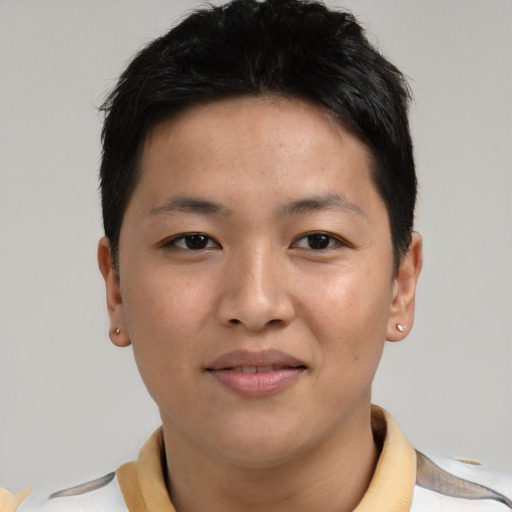 Joyful asian young-adult male with short  black hair and brown eyes