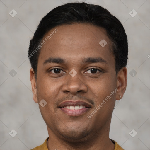 Joyful latino young-adult male with short  black hair and brown eyes