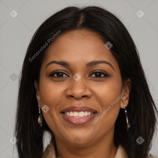 Joyful black young-adult female with long  brown hair and brown eyes