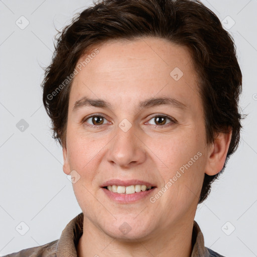 Joyful white adult female with short  brown hair and brown eyes