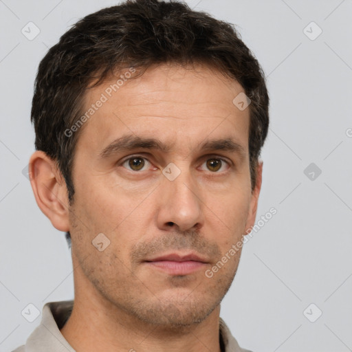 Neutral white adult male with short  brown hair and brown eyes