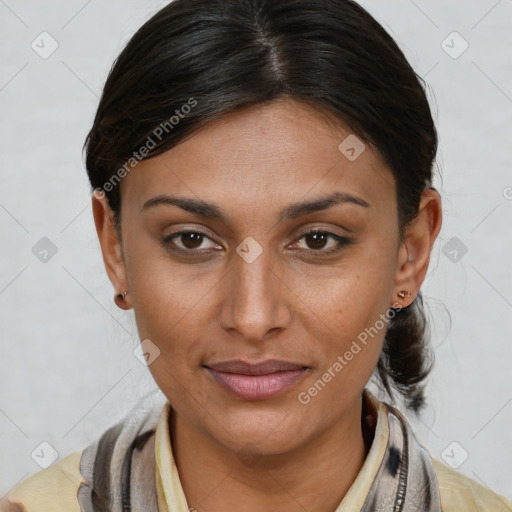 Joyful latino young-adult female with medium  brown hair and brown eyes