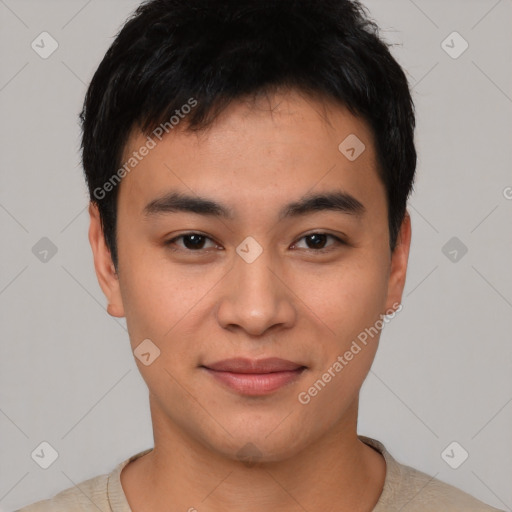 Joyful asian young-adult male with short  black hair and brown eyes