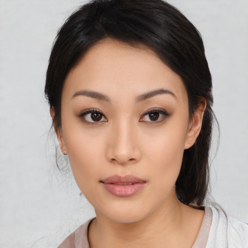 Neutral latino young-adult female with medium  black hair and brown eyes
