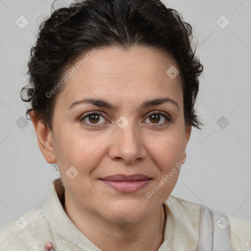 Joyful white adult female with short  brown hair and brown eyes