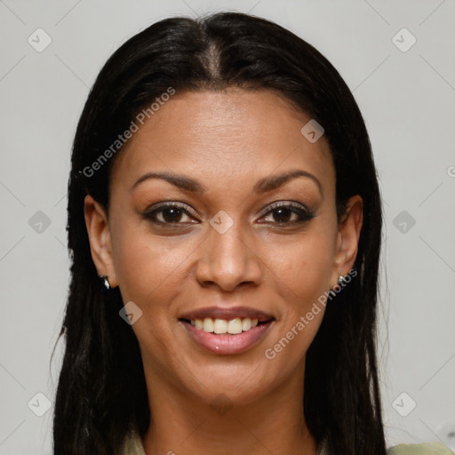 Joyful black young-adult female with long  brown hair and brown eyes