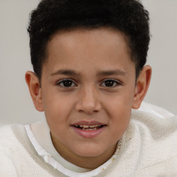 Joyful white child male with short  brown hair and brown eyes