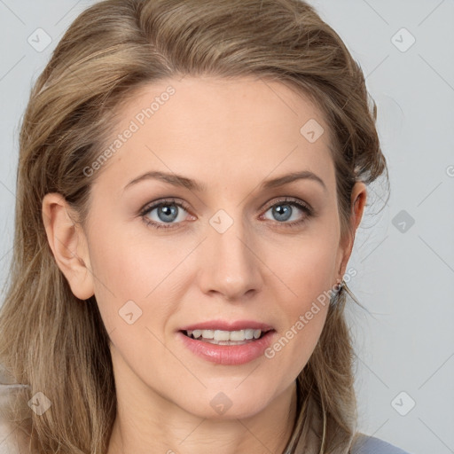 Joyful white young-adult female with medium  brown hair and blue eyes